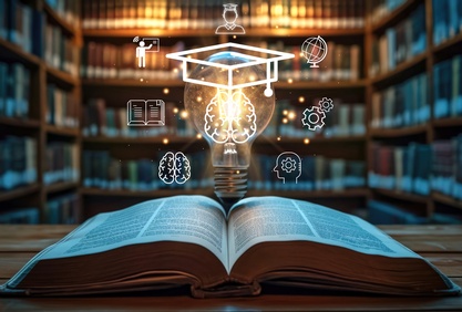 Open book with light bulb with graduation hat